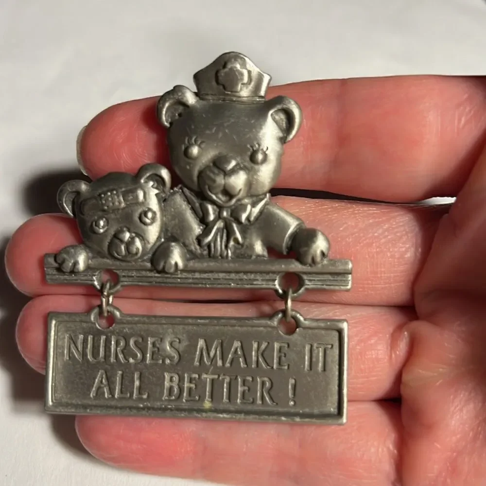 Vintage JJ pin Brooch pewter nurse & bear.